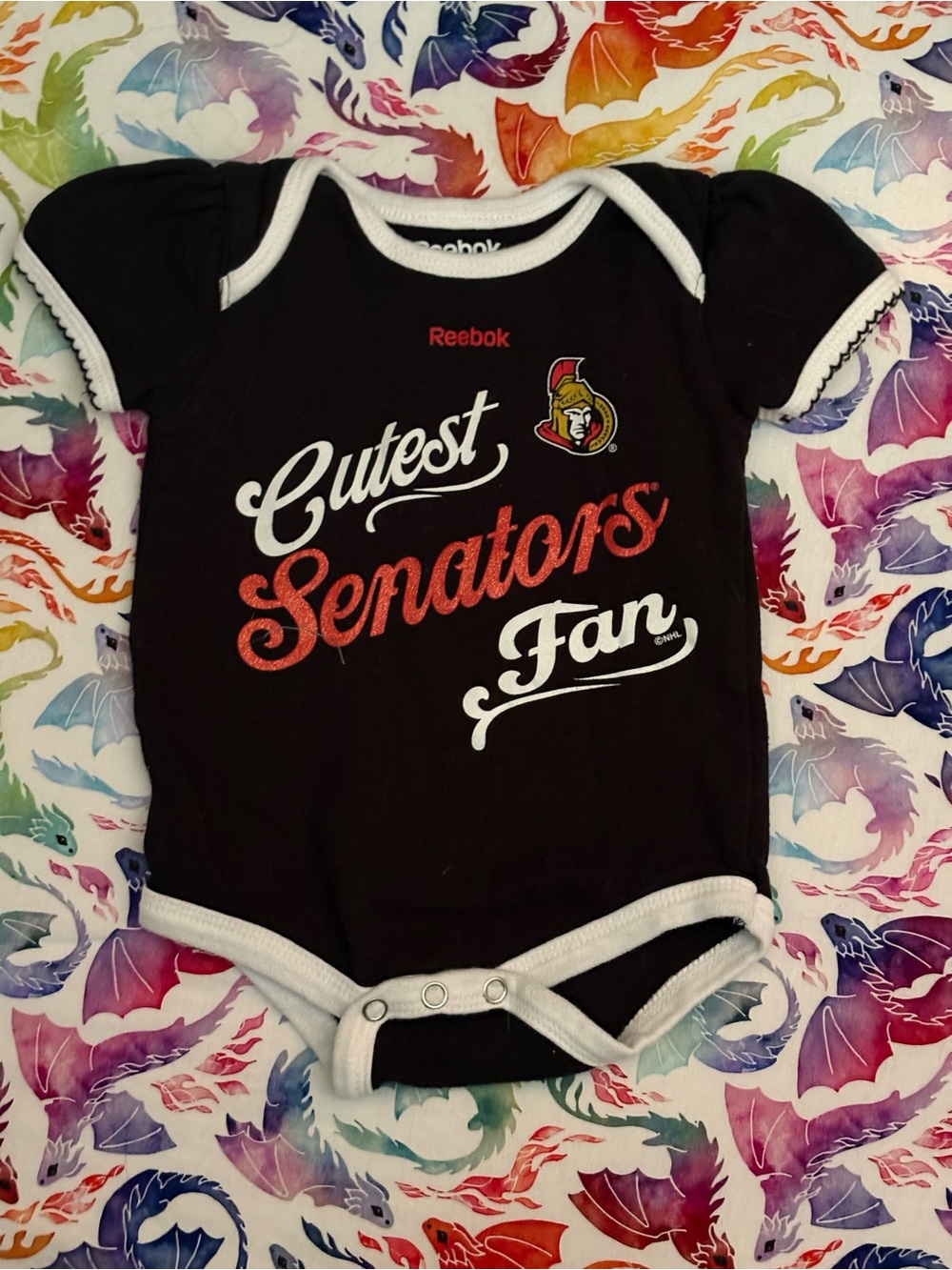 Reebok Black Baby Onesie with 'Cutest Senators Fan'